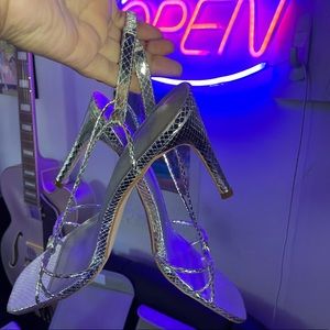 Metallic gray heels.